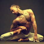 Young woman doing stretching and pilates exercises. Yoga, flexibility, body flexibility development, healthy lifestyle.